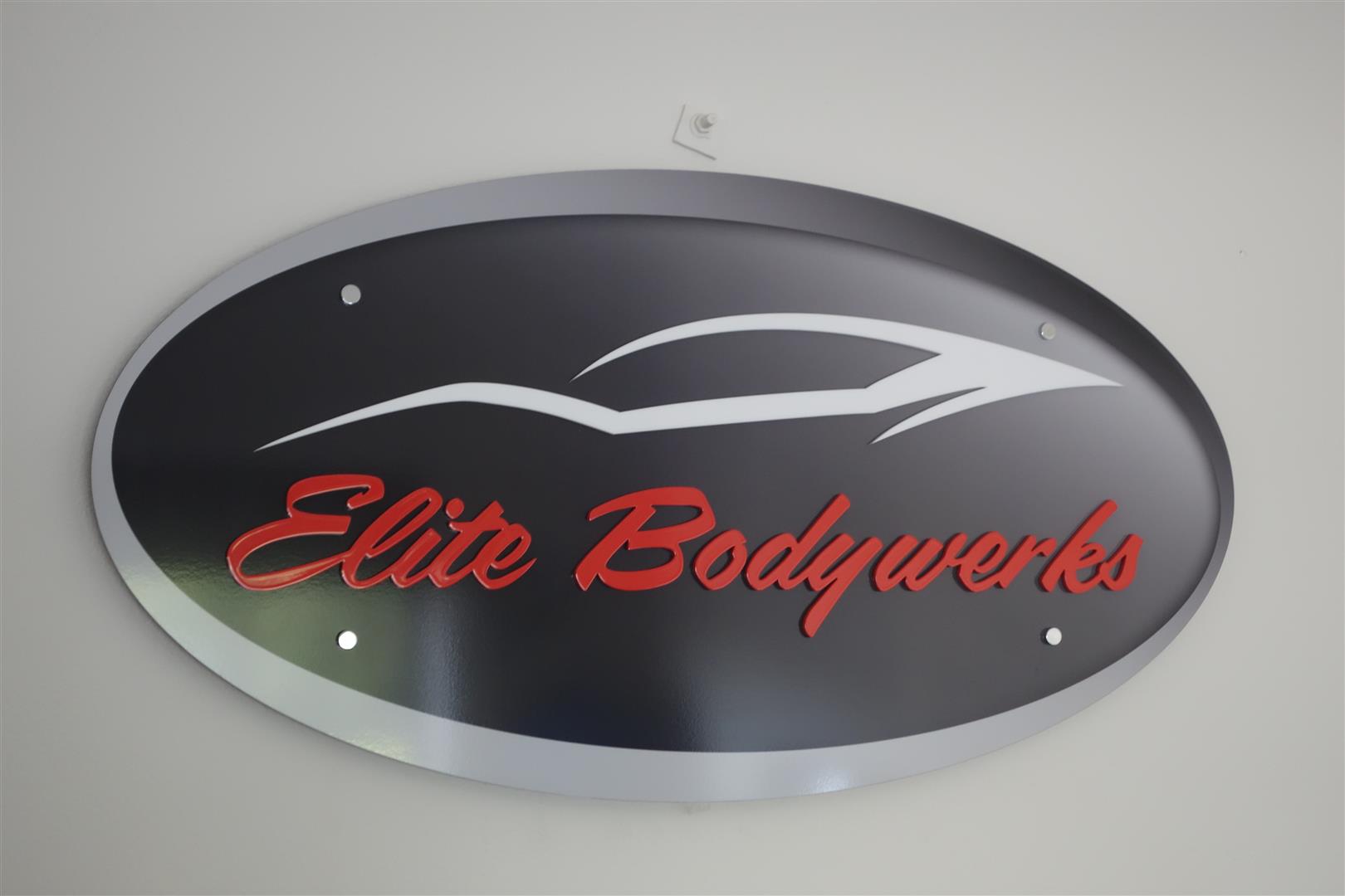 Elite Bodywerks MW Logo